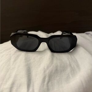 Prada Black Rectangular Sunglasses. No case just box. To tight for me. Used twic